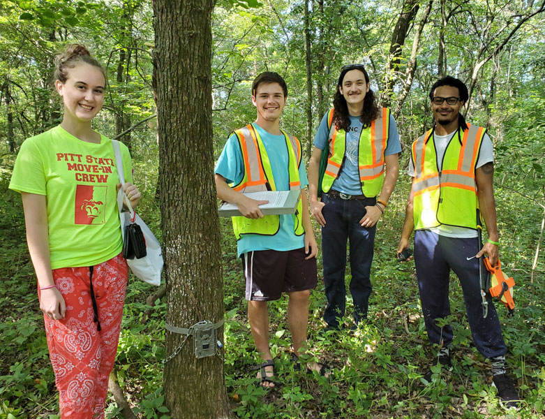 Group of researchers looking happy