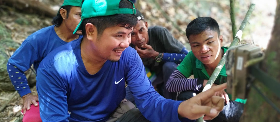 Staff working with camera
